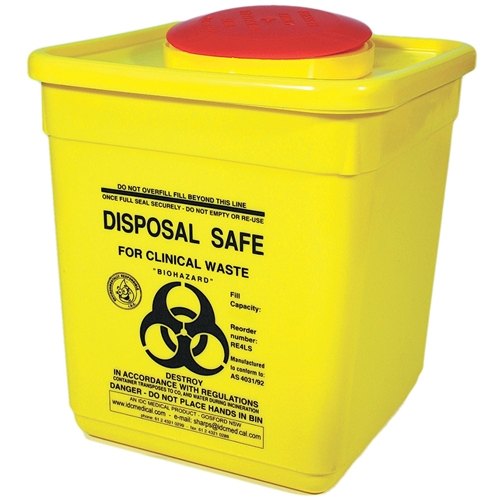 Professional handling biohazardous waste in a controlled facility